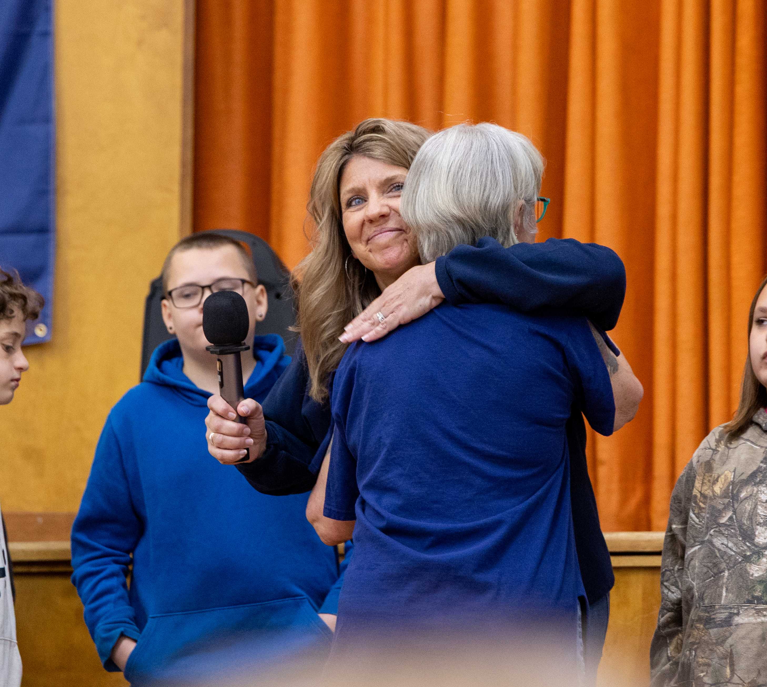 Mrs. Rightmyer hugs Ms. Patty at Radez Rally